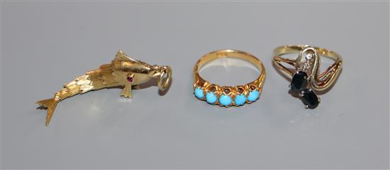 An 18ct and five stone turquoise half hoop ring, a 14k and gem set ring and and 18ct gold articulated fish pendant.